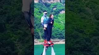 Flyboard ride is so fun  girl enjoy flying on water