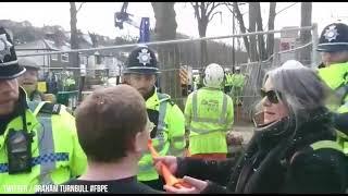 Bizarre Moment Tree Protester Is Arrested For Blowing Toy Trumpet
