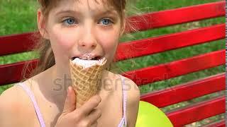 Stock Footage - French Teenager eating Ice Cream 2