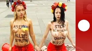 Topless against Putin Femen activists protest in Italy ahead of Russia-Ukraine talks
