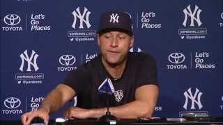 Derek Jeter answers phone during Derek Jeter Day press conference