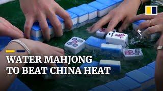 China beats record heatwave with water mahjong and pools of ice