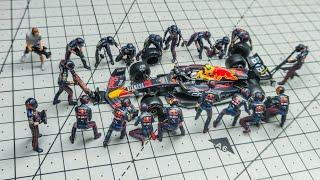 MINI GT 164 RedBull F1 Pit Crew Set With Diecast REDBULL RB18 Unboxing and Review