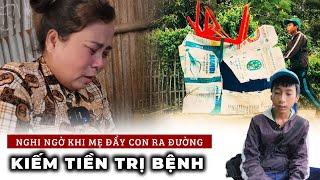 Nghi ngờ khi MẸ TRẺ đẩy con và cháu ra đường cùng chiếc xe tự chế kiếm tiền cho mình trị bệnh