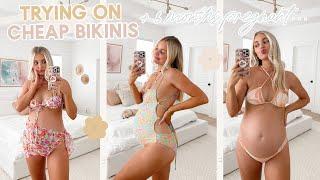 trying on cheap bikinis 8 months pregnant  Aspyn Ovard