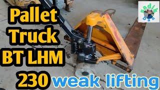 repairing weak lifting pallet truck  BT LHM230 Quicklift Sweden