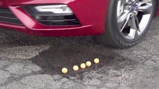 FOX Car Report - Car that can jump potholes