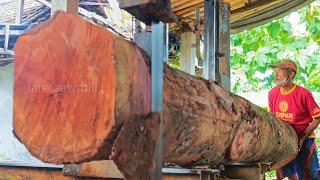 Sawing good old durian wood into thick boards for the truck bed