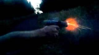 FNH FNP-45 muzzle flash at dusk