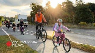 All aboard the bike bus These students bike 3 km to school