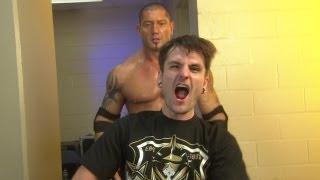 A WWE fan sneaks backstage to see Batista