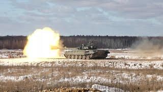 Russian main battle tanks T-72B3 and T-80BV fire