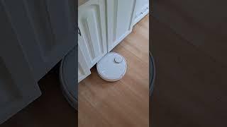 Vacuum Robot cleaning kitchen