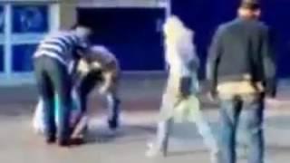 Man beats women on the street