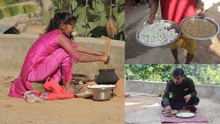 village girl making popcorn in traditional cooking mud pot and eating with grind spice vlog