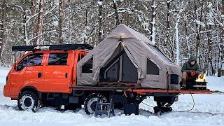 Inflatable Tent on a Small Truck Winter Camping with Old Cat
