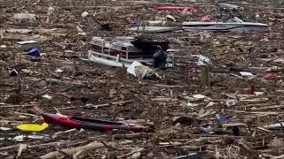 Video shows North Carolina lake almost completely filled with debris from Hurricane Helene