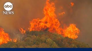 Thousands forced to evacuate as California wildfires rage