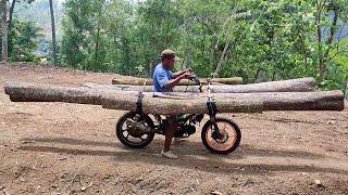 the extraordinary skills of the wooden taxi drivers carrying very long pieces of wood