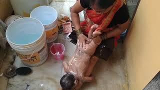 Baby Traditional bath by grand mother #baby# #cutiepie# #little Prince Charming#  #trending #viral