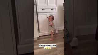 Baby pooping in the corner 