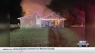 Fire crews battle overnight house fire in Gulfport