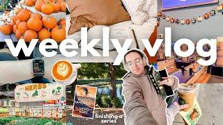 a cozy fall reading vlog finishing Mistborn & library book haul  WEEKLY VLOG