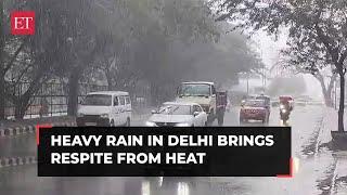 Heavy rain in Delhi brings respite from intense heat