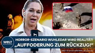 UKRAINE-KRIEG Rückzug in Wuhledar Russische Flaggen gehisst - Gebiet unter Putins Kontrolle