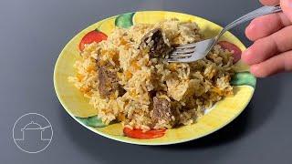 Leckerer Plov mit Reis und Fleisch. Sehr einfach zubereitet. Russisches Gericht. Viktor Delicious