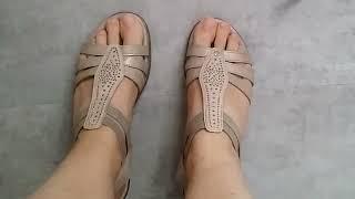 Fixing strappy sandals by adjusting the straps