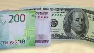 Russian rouble slides past 101 vs dollar