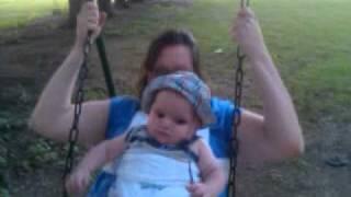 Soren swinging. Close up.