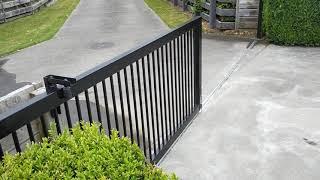 Premier Sliding Gate 1m high 6m wide. Uneven driveway.