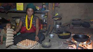 Cooking and eating by happy family in village  Nepali village