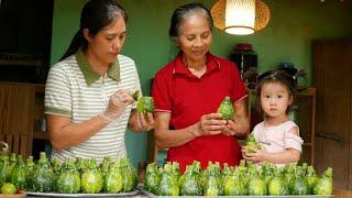 Mother-in-law and daughter-in-law Harvesting Pumpkins after the rain with a Happy Family meal