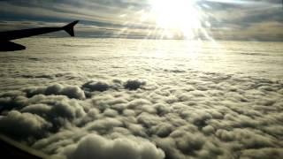 Airplane above the clouds taking off flying and landing - AMAZING