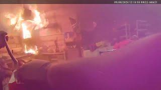 Body cam shows Roscommon Co. deputy run into burning garage putting out fire