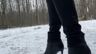 High heel Ankle boots in the snow