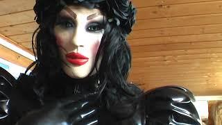 Rubberdoll Lisa puts on her Latex Gothic Gloves