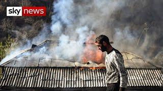 Nagorno-Karabakh Armenian homes burned down in defiance