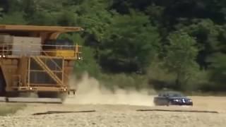 LARGE DUMP TRUCK CHASING A TINY CAR   SCARY