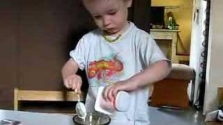 23 month old making his own snack montessori