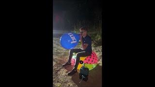 Boy Sit on Beachball and Popping Big Balloons -- Outside #1